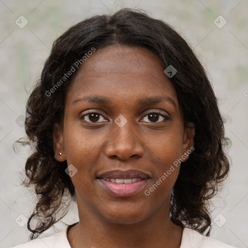 Joyful black young-adult female with medium  brown hair and brown eyes