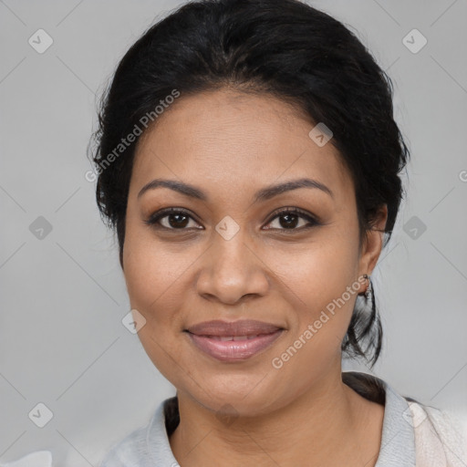 Joyful latino young-adult female with medium  black hair and brown eyes