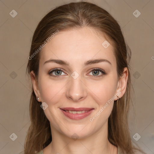 Joyful white young-adult female with long  brown hair and grey eyes