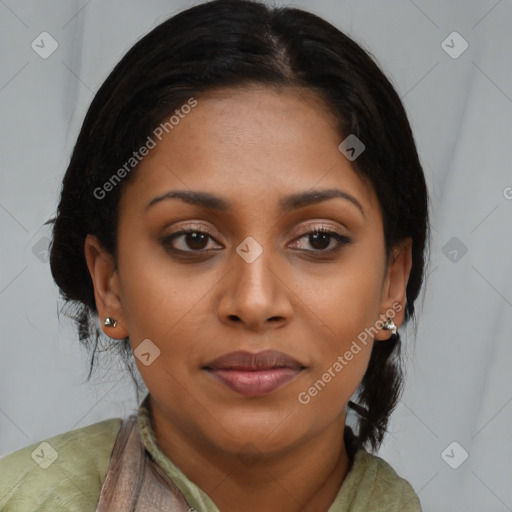 Joyful black young-adult female with long  brown hair and brown eyes
