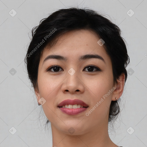 Joyful asian young-adult female with medium  black hair and brown eyes