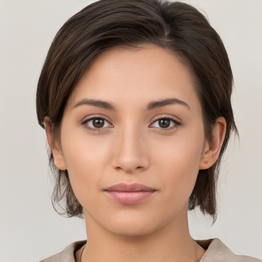 Neutral white young-adult female with medium  brown hair and brown eyes