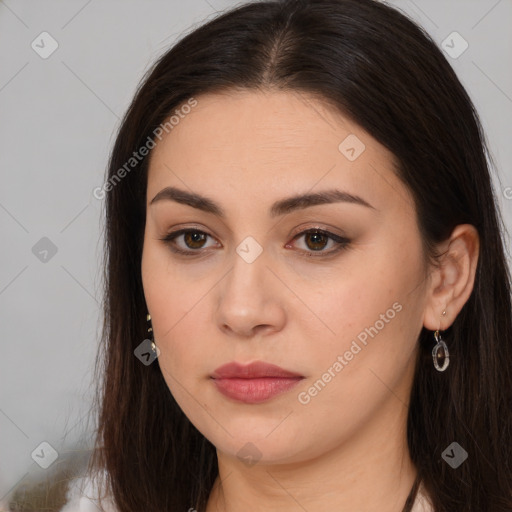 Neutral white young-adult female with long  brown hair and brown eyes