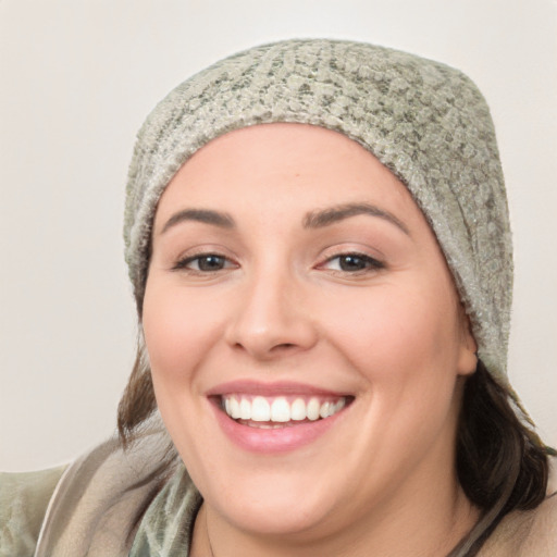 Joyful white young-adult female with short  black hair and brown eyes