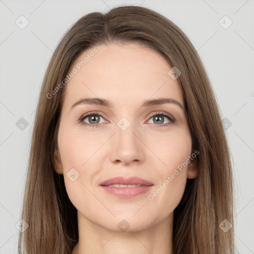 Joyful white young-adult female with long  brown hair and grey eyes