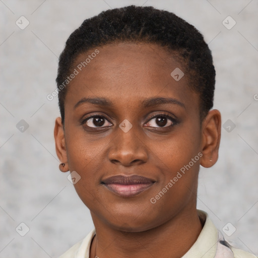 Joyful black young-adult female with short  brown hair and brown eyes