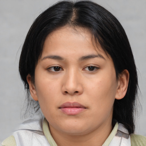 Neutral asian young-adult female with medium  brown hair and brown eyes