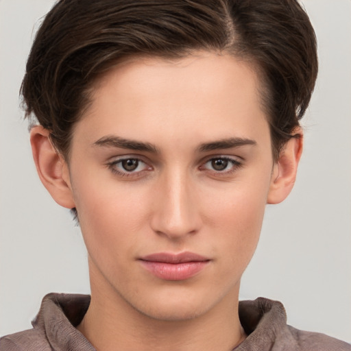 Neutral white young-adult female with short  brown hair and brown eyes