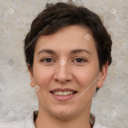 Joyful white adult female with short  brown hair and brown eyes