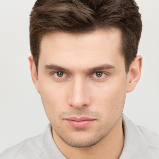 Neutral white young-adult male with short  brown hair and brown eyes