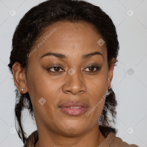 Joyful latino adult female with medium  brown hair and brown eyes