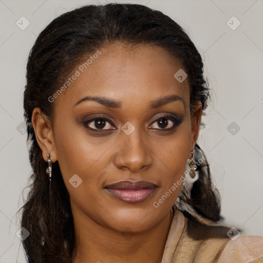 Joyful black young-adult female with long  brown hair and brown eyes