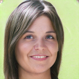 Joyful white young-adult female with long  brown hair and blue eyes