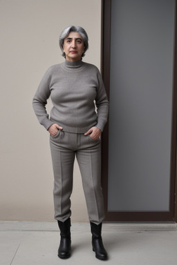 Azerbaijani middle-aged non-binary with  gray hair