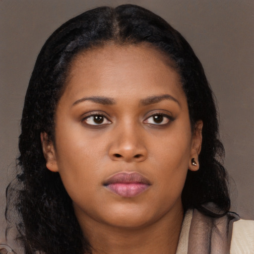 Neutral black young-adult female with long  black hair and brown eyes