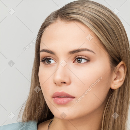 Neutral white young-adult female with long  brown hair and brown eyes