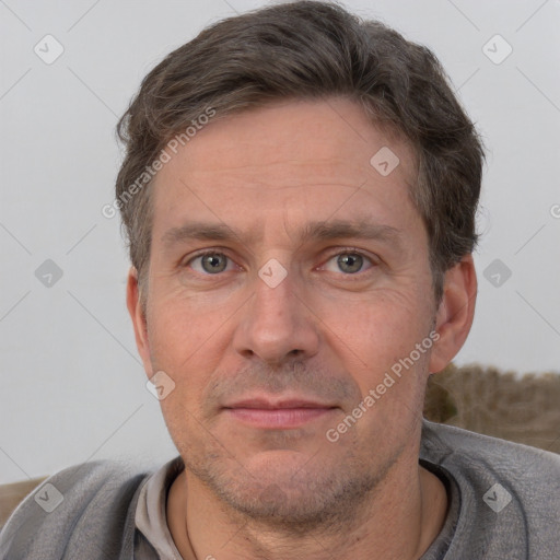 Neutral white adult male with short  brown hair and brown eyes