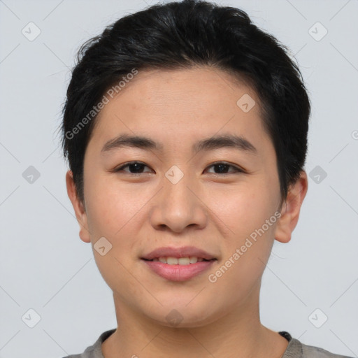 Joyful asian young-adult male with short  brown hair and brown eyes