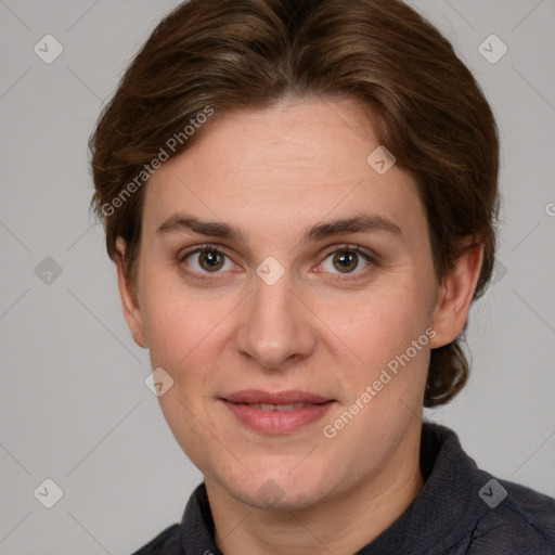 Joyful white adult female with short  brown hair and brown eyes