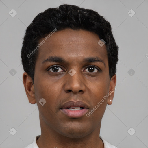 Neutral black young-adult male with short  brown hair and brown eyes