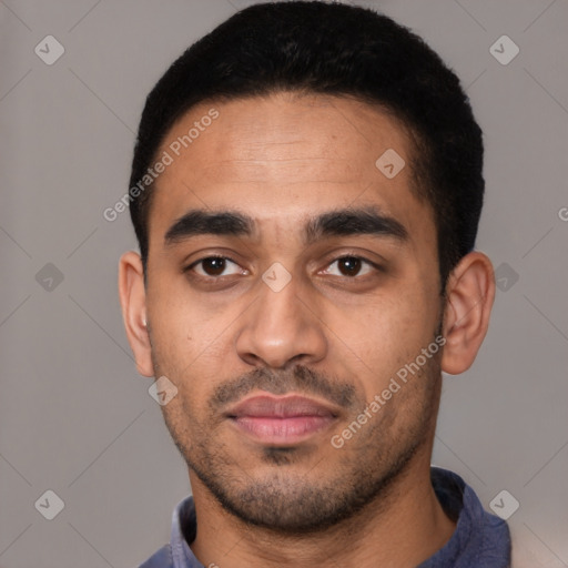 Neutral latino young-adult male with short  black hair and brown eyes