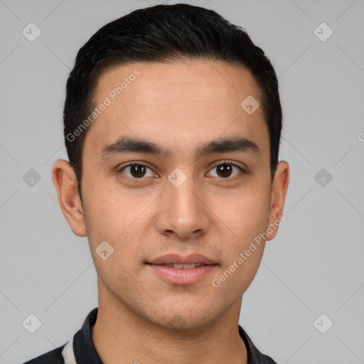 Joyful white young-adult male with short  black hair and brown eyes