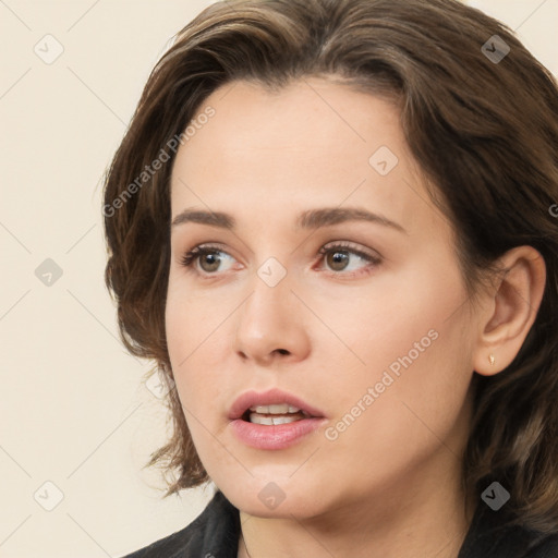 Neutral white young-adult female with medium  brown hair and brown eyes