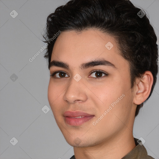 Joyful white young-adult male with short  black hair and brown eyes