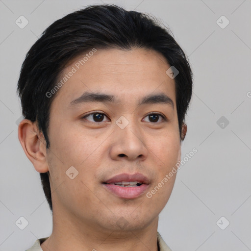 Joyful asian young-adult male with short  brown hair and brown eyes