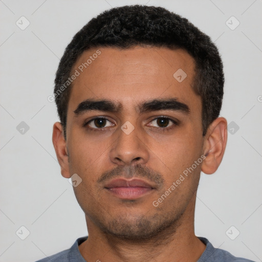 Neutral latino young-adult male with short  black hair and brown eyes