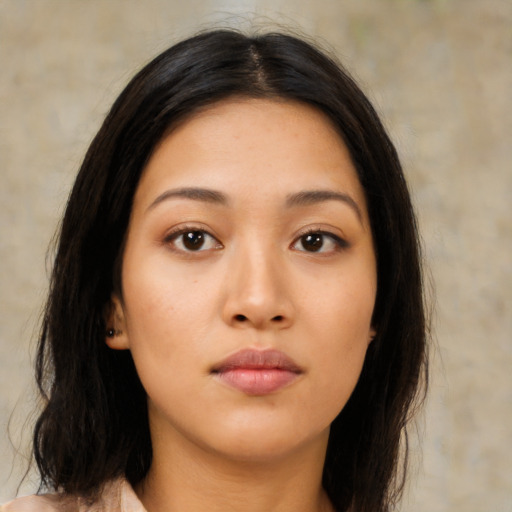 Neutral asian young-adult female with medium  brown hair and brown eyes