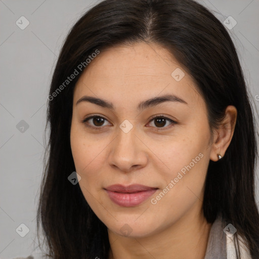 Joyful asian young-adult female with long  brown hair and brown eyes