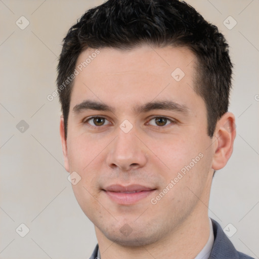 Joyful white young-adult male with short  brown hair and brown eyes