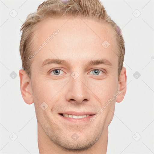 Joyful white adult male with short  brown hair and grey eyes