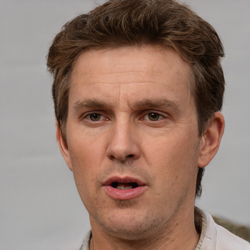 Neutral white adult male with short  brown hair and brown eyes