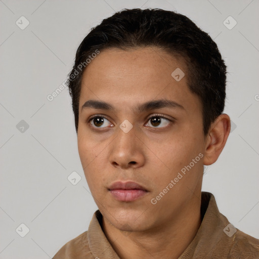 Neutral white young-adult male with short  black hair and brown eyes