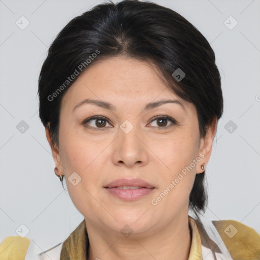 Joyful asian adult female with medium  brown hair and brown eyes