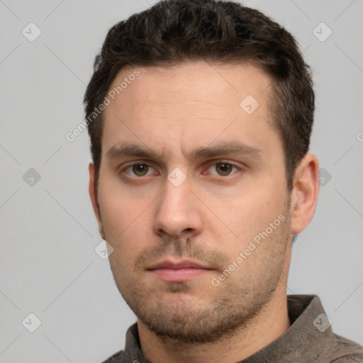 Neutral white young-adult male with short  brown hair and grey eyes