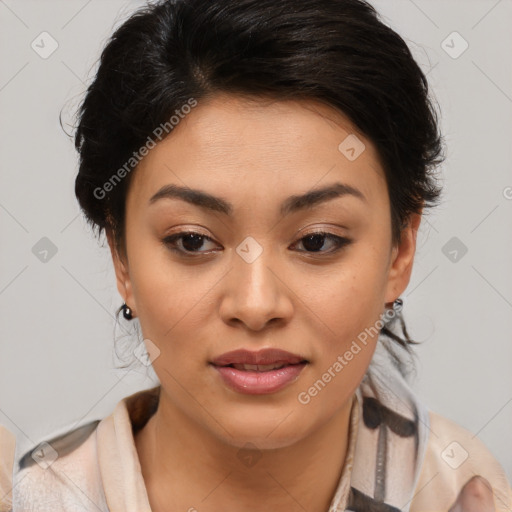 Joyful latino young-adult female with medium  brown hair and brown eyes