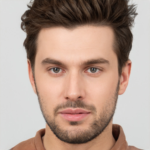 Neutral white young-adult male with short  brown hair and brown eyes