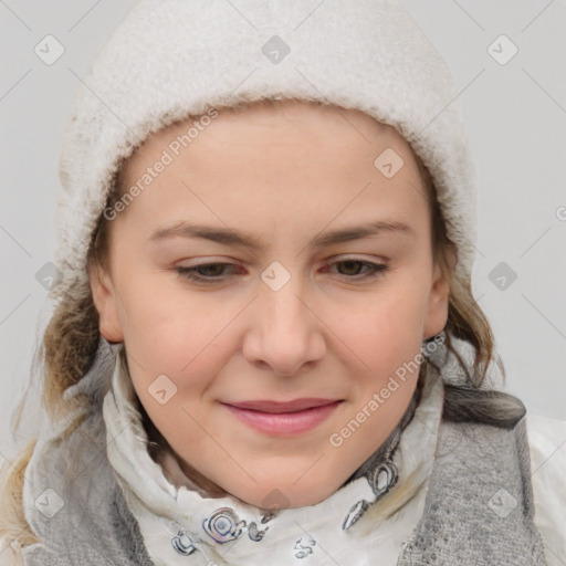 Joyful white young-adult female with medium  brown hair and blue eyes