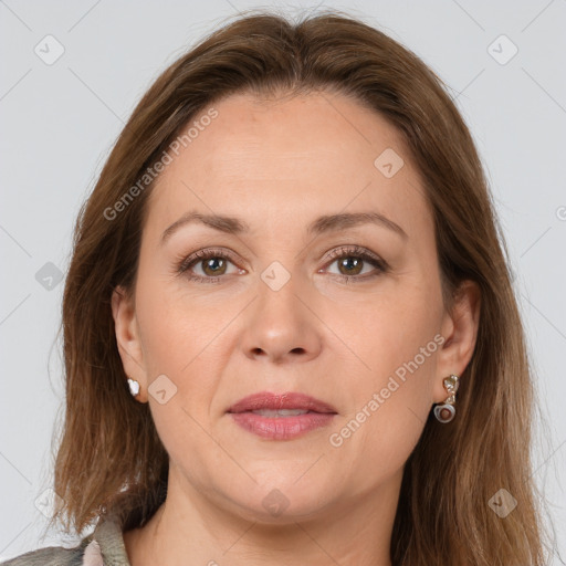 Joyful white adult female with medium  brown hair and brown eyes