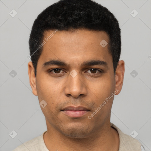 Neutral latino young-adult male with short  black hair and brown eyes