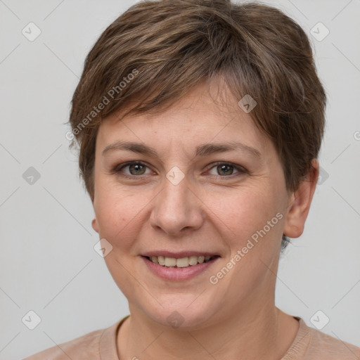 Joyful white young-adult female with short  brown hair and grey eyes