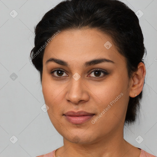 Joyful latino young-adult female with medium  brown hair and brown eyes