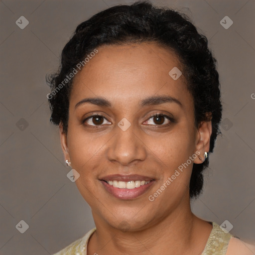 Joyful latino young-adult female with short  black hair and brown eyes