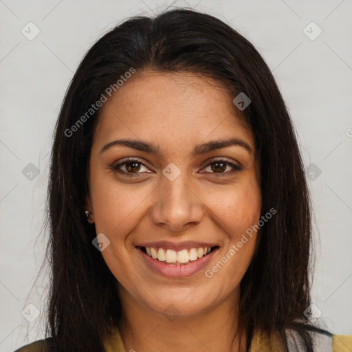 Joyful latino young-adult female with long  brown hair and brown eyes