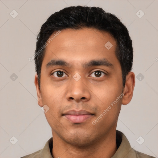 Neutral latino young-adult male with short  black hair and brown eyes