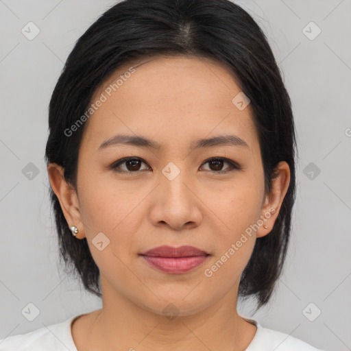 Joyful asian young-adult female with medium  brown hair and brown eyes