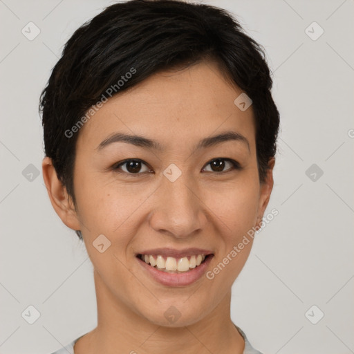 Joyful asian young-adult female with short  brown hair and brown eyes